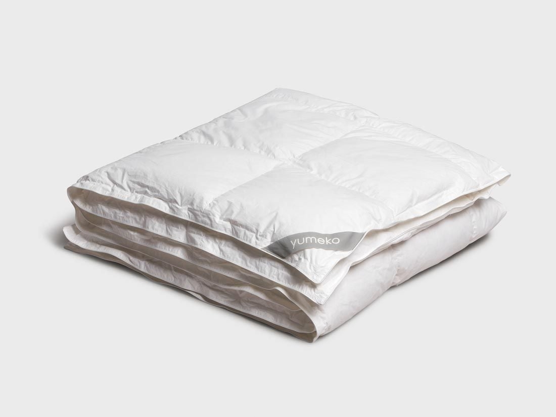 Couette en duvet et plumettes tempérée