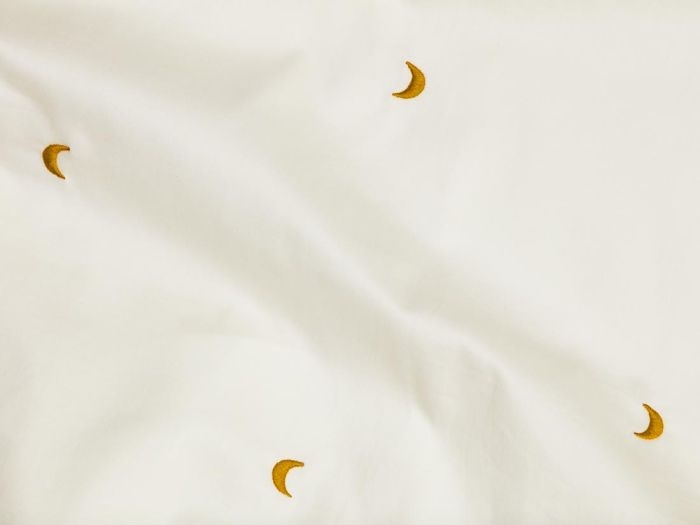 Taie d'oreiller satin de coton blanc chaud/lune ocre